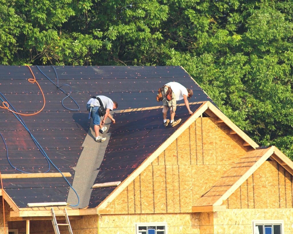 Roofers installing a new roof